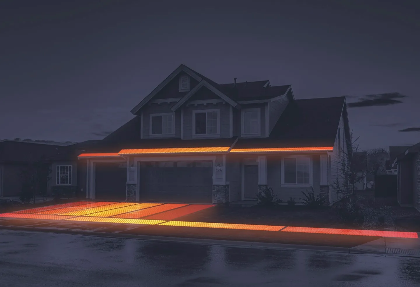 A house shown with its heated surfaces glowing, powered from the roof