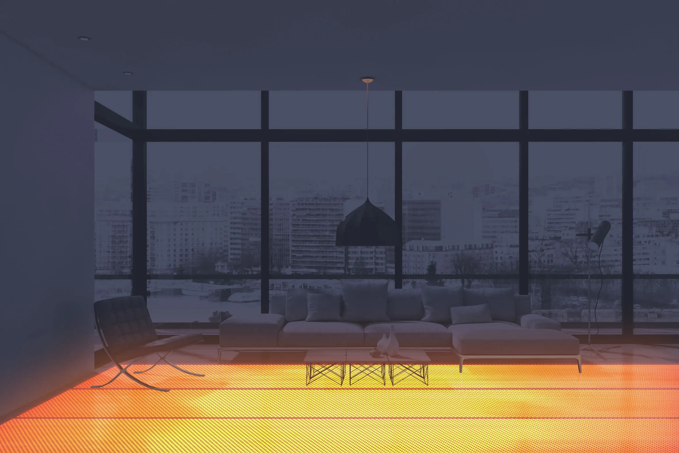 A living room at dusk with the entire floor glowing as a radiant heating surface