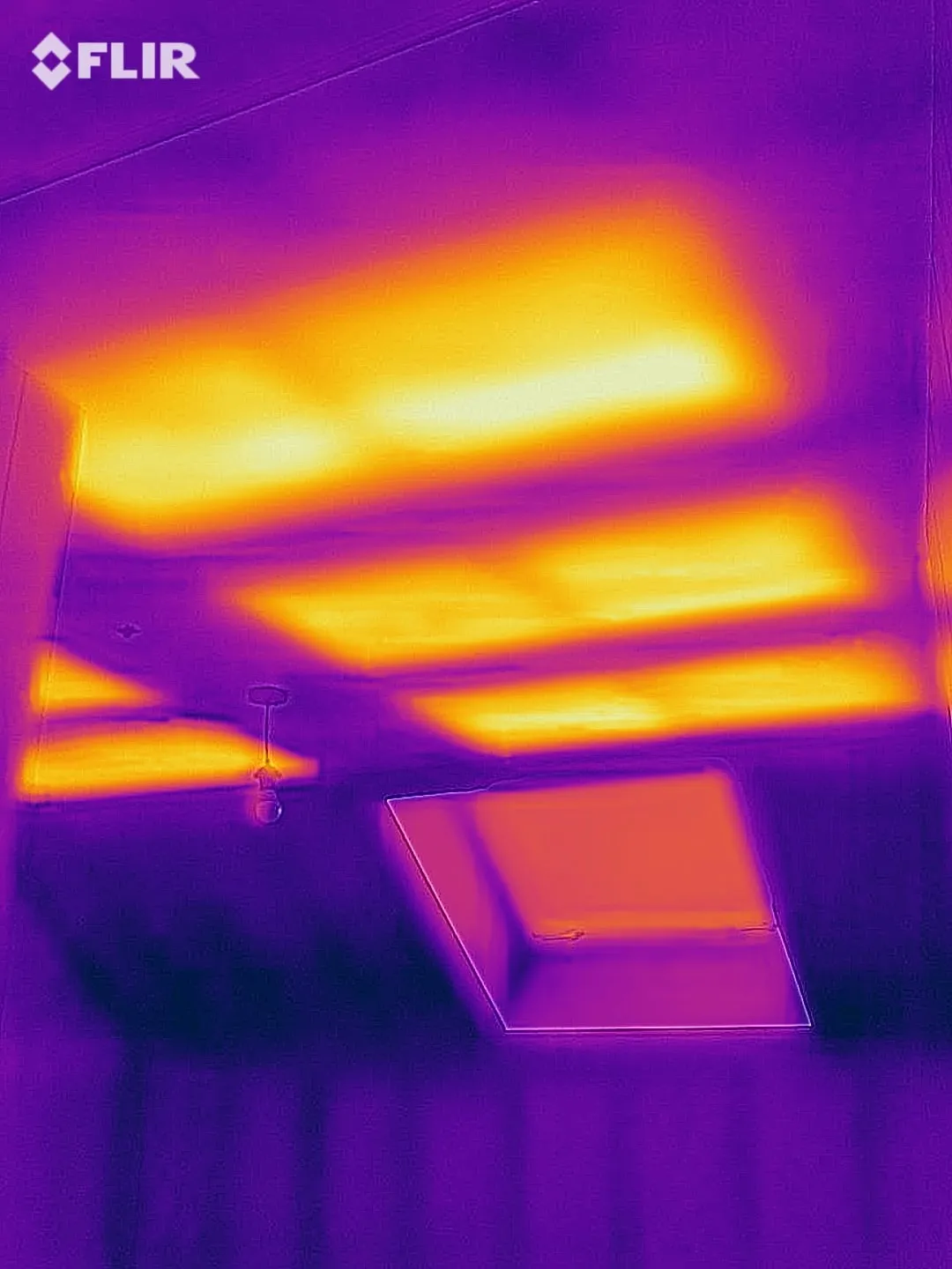 Thermal camera image of ceiling heating panels running at an even, low temperature