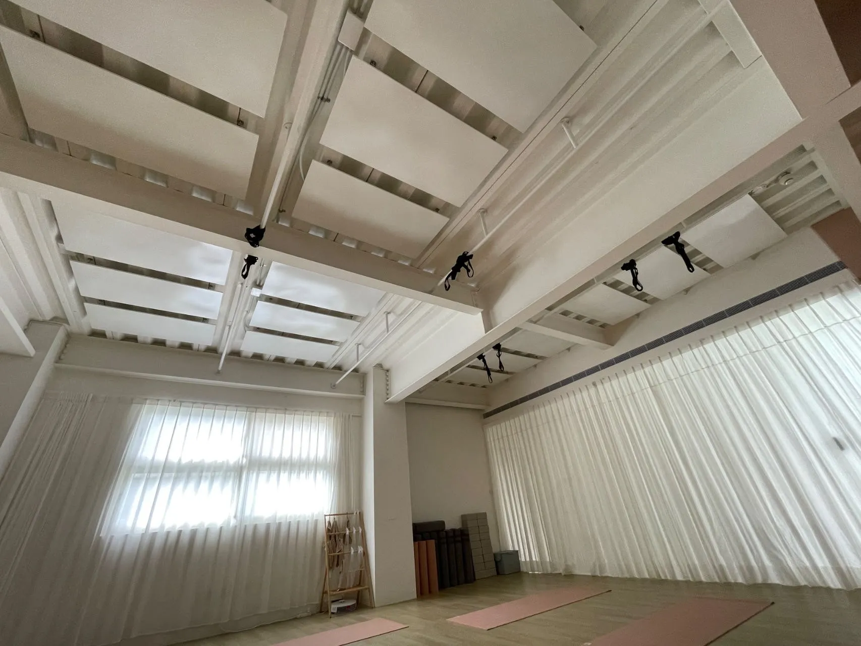 A large hall with heating panels concealed in the ceiling
