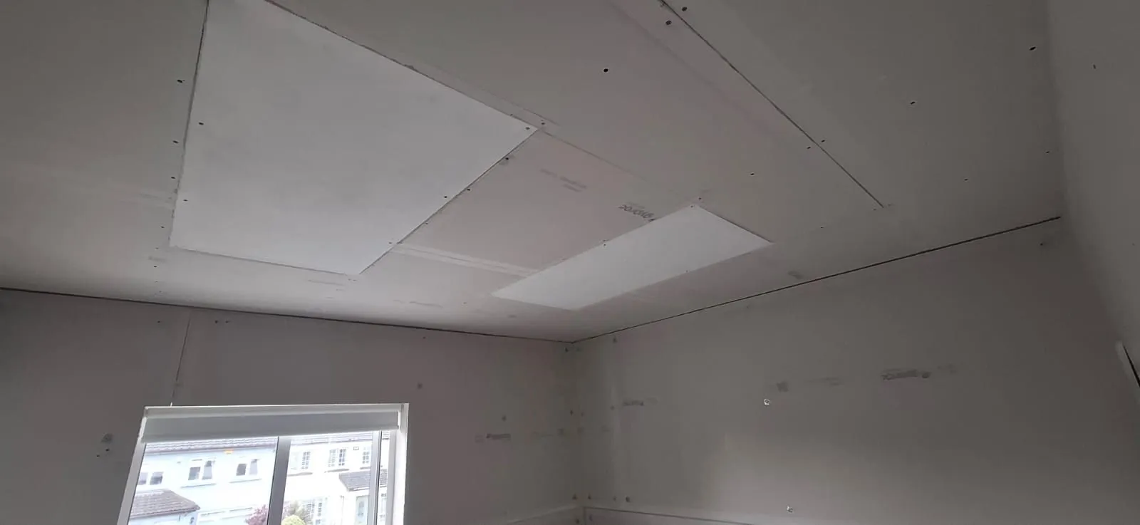 PowerBoard 250 panels set into a plasterboard ceiling before skimming