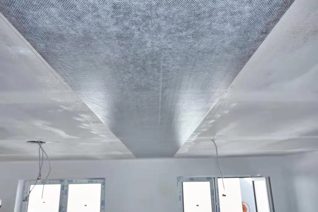 ComfortScrim strips fixed across a ceiling before plastering