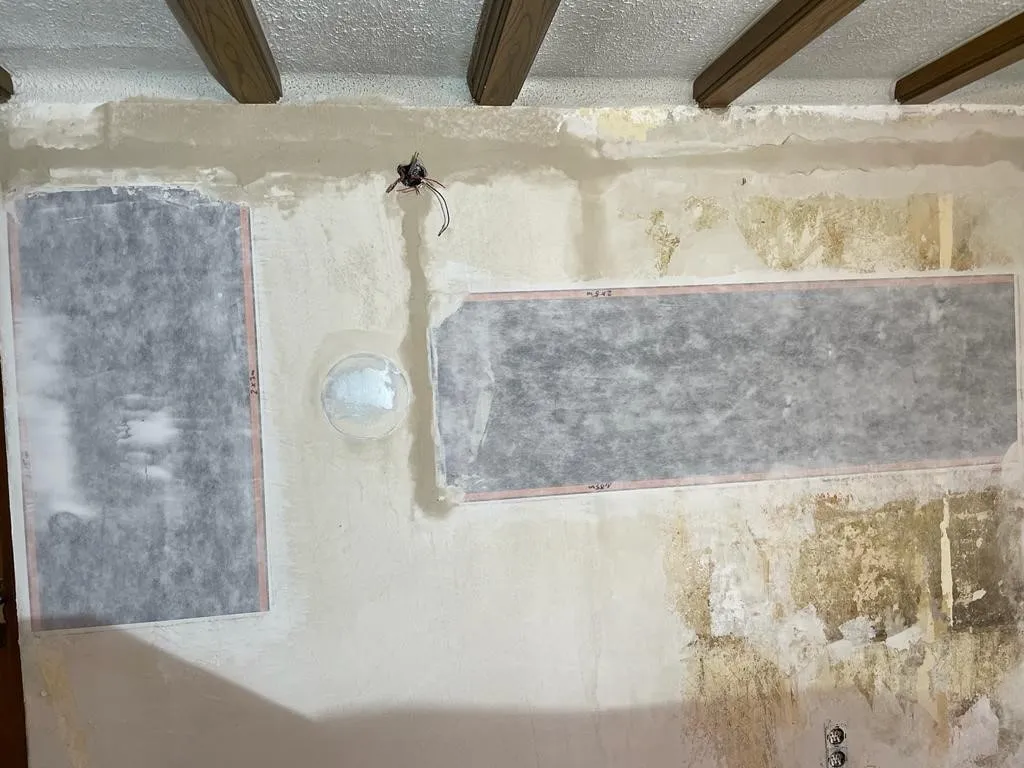 A heritage room with heating elements applied to the wall before plastering